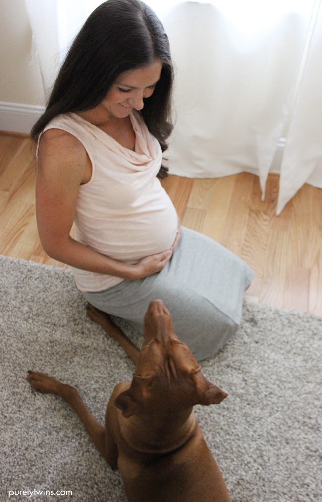 new mom and her dog maternity shot