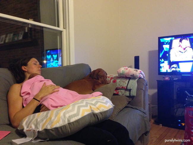 new-mom-sleeping-with-baby-watching-the-voice
