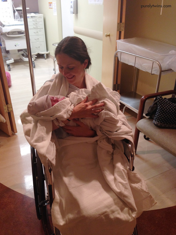 new-mom-and-baby-girl-newborn-at-hospital-leaving-birthing-room