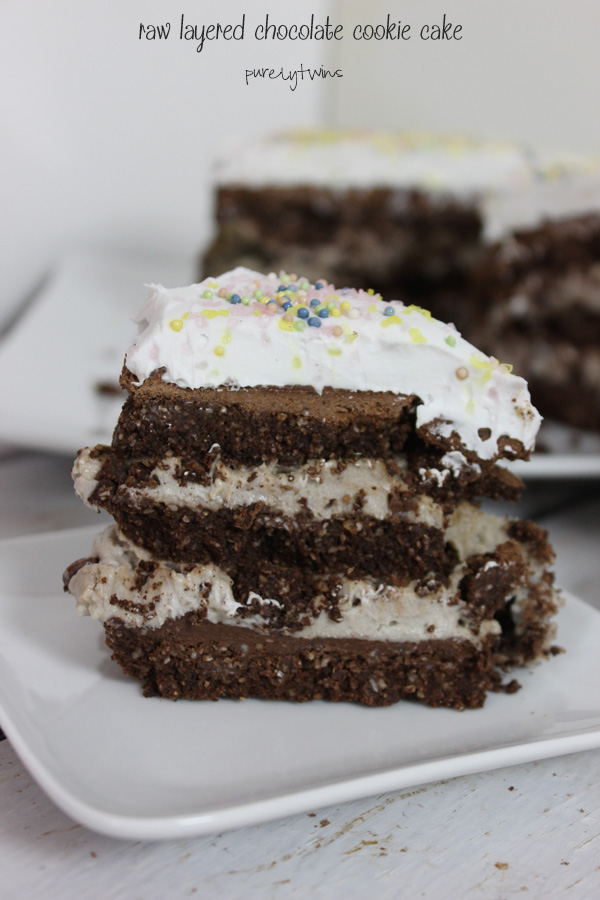 Looking for a deliciously healthy raw cake that is made from simple healthly ingredients this cake is for you. The ultimate layered flourless chocolate cookie dough unbaked cake with homemade whipped cream || purelytwins.com #rawdessert #glutenfree #healthydessert #dairyfree #vegan