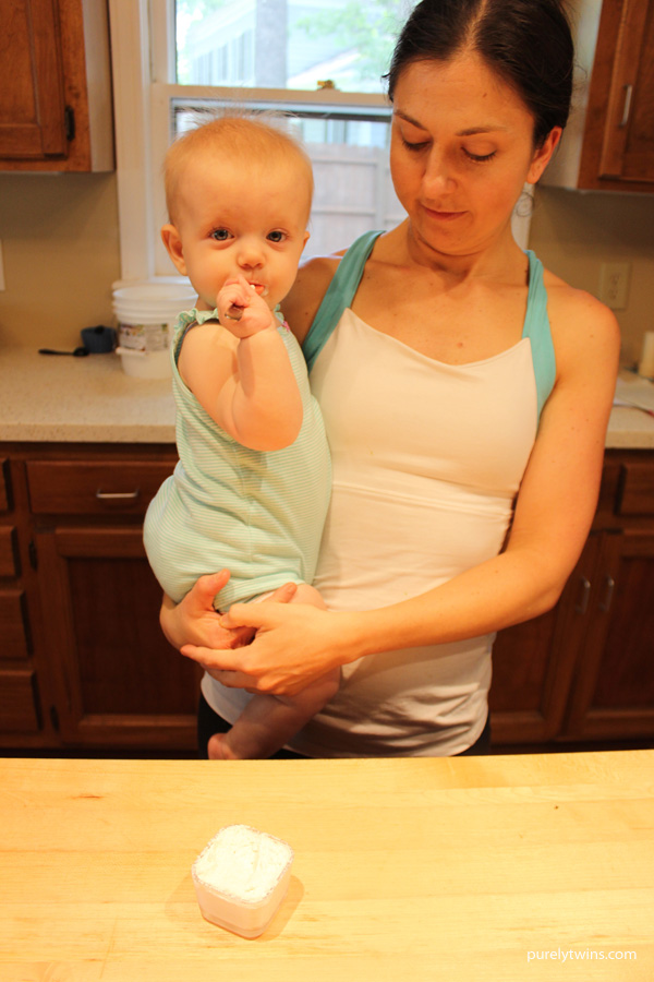 10-month-baby-learning-how-to-use-a-spoon-to-eat-homemade-yogurt-purelytwins