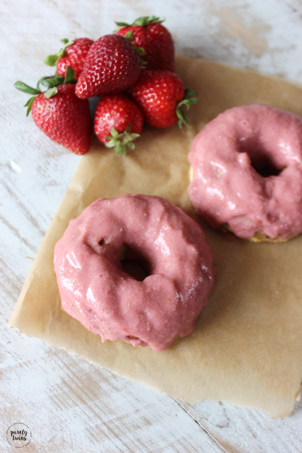 These Strawberry Cake Donuts with Strawberry Glaze are perfect for breakfast or a snack! They're easy to make. Made from plantains, tigernut flour, coconut butter and strawberries. Crazy good and super simple. Serves 2.
