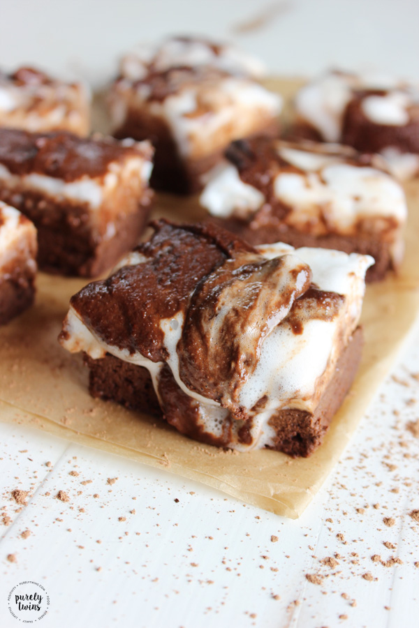 Rich chocolate flourless brownies, gooey chocolate topping, and perfectly fluffy marshmallows make these brownies the perfect summer treat. We think it is perfect anytime. Fun and easy to make too. No flour. No eggs. No nuts. Low in sugar. The BEST marshmallow brownies EVER.