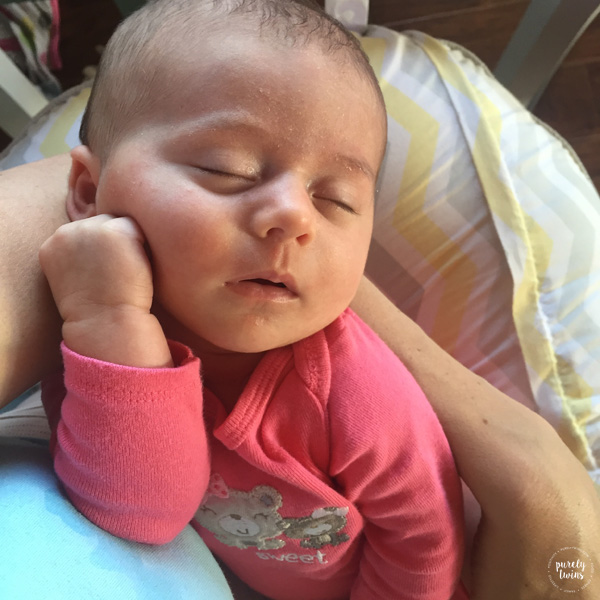 sleeping-5-week-old-in-moms-arms