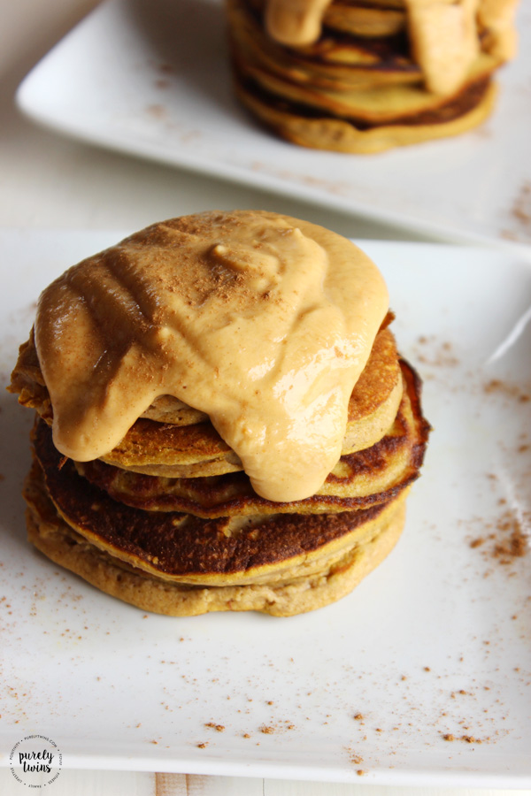 Flourless Pumpkin Pancakes - these are TO DIE FOR! The best fall pancakes ever! Packed with pumpkin and spice and topped with a dreamy dairy-free pumpkin whipped cream. These pancakes are soft, fluffy, moist and absolutely delicious! Gluten-free, grain-free and nut-free pancake recipe. Paleo friendly. 