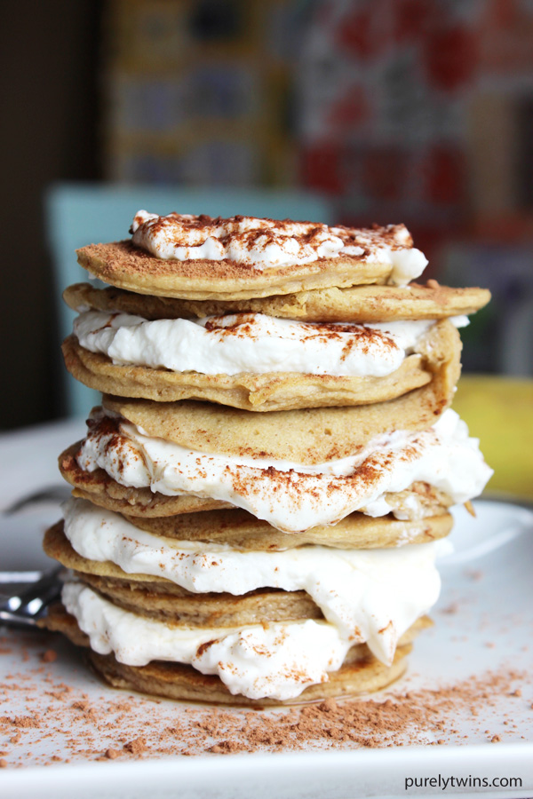Picture this: Your fork gliding through a cloud of fluffy pancakes infused with coffee and topped with cream, a bit of cocoa settling on top. Click to get your easy healthy recipe for gluten-free paleo friendly tiramisu pancakes. Includes a video. 