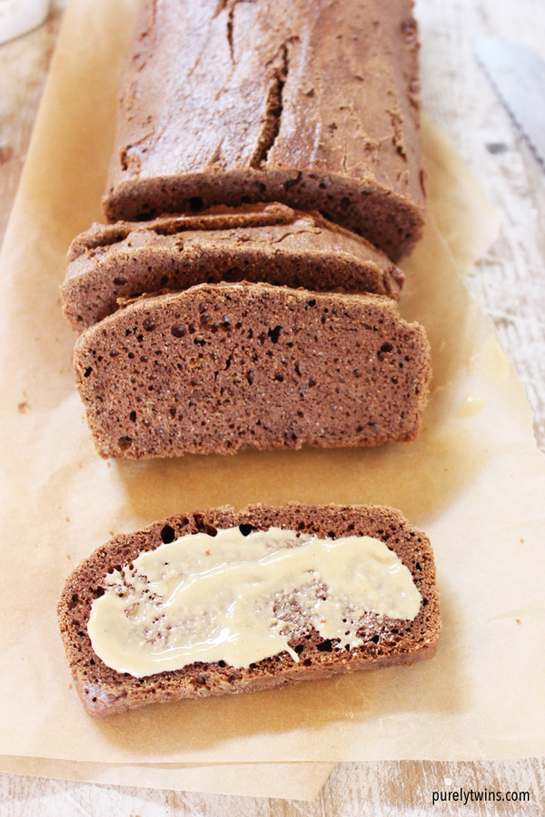 The best quick bread recipe that is gluten and grain free - Chocolate protein tahini bread. The perfect combo of flavors and the texture that's light and chewy. Everything you want out of a bread. This chocolate tahini bread recipe is full of healthy fats and a boost of additional protein. This beats store bought bread any day. If you love tahini you're going to love this bread. Plus it only needs 8 simple ingredients to whip up one healthy snack and no flour needed!