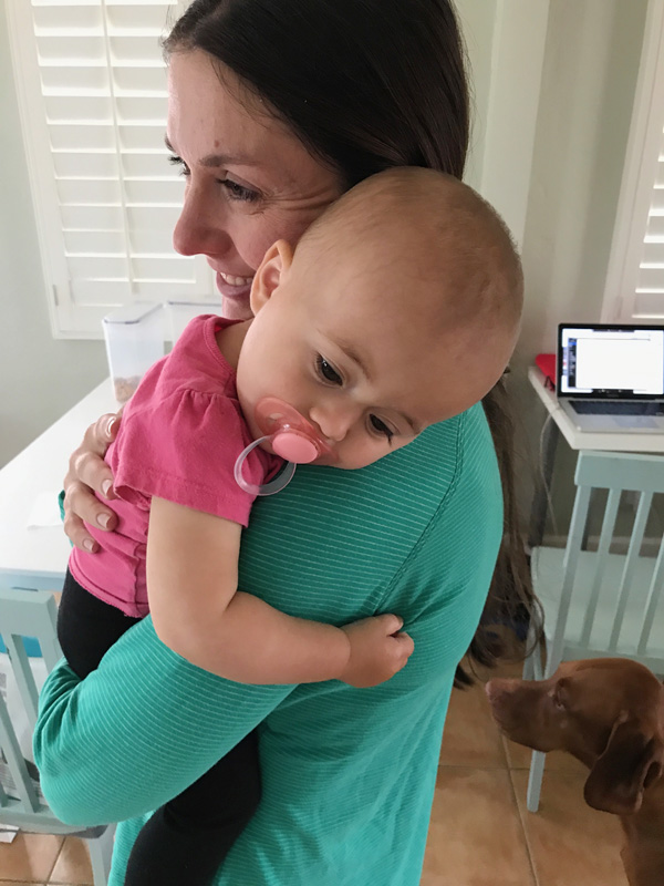 11 month old giving her mom a hug