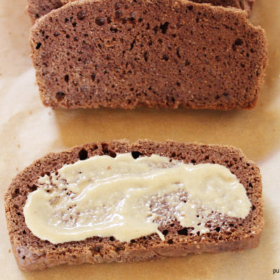The best quick bread recipe that is gluten and grain free - Chocolate protein tahini bread. The perfect combo of flavors and the texture that's light and chewy. Everything you want out of a bread. This chocolate tahini bread recipe is full of healthy fats and a boost of additional protein. This beats store bought bread any day. If you love tahini you're going to love this bread. Plus it only needs 8 simple ingredients to whip up one healthy snack and no flour needed!